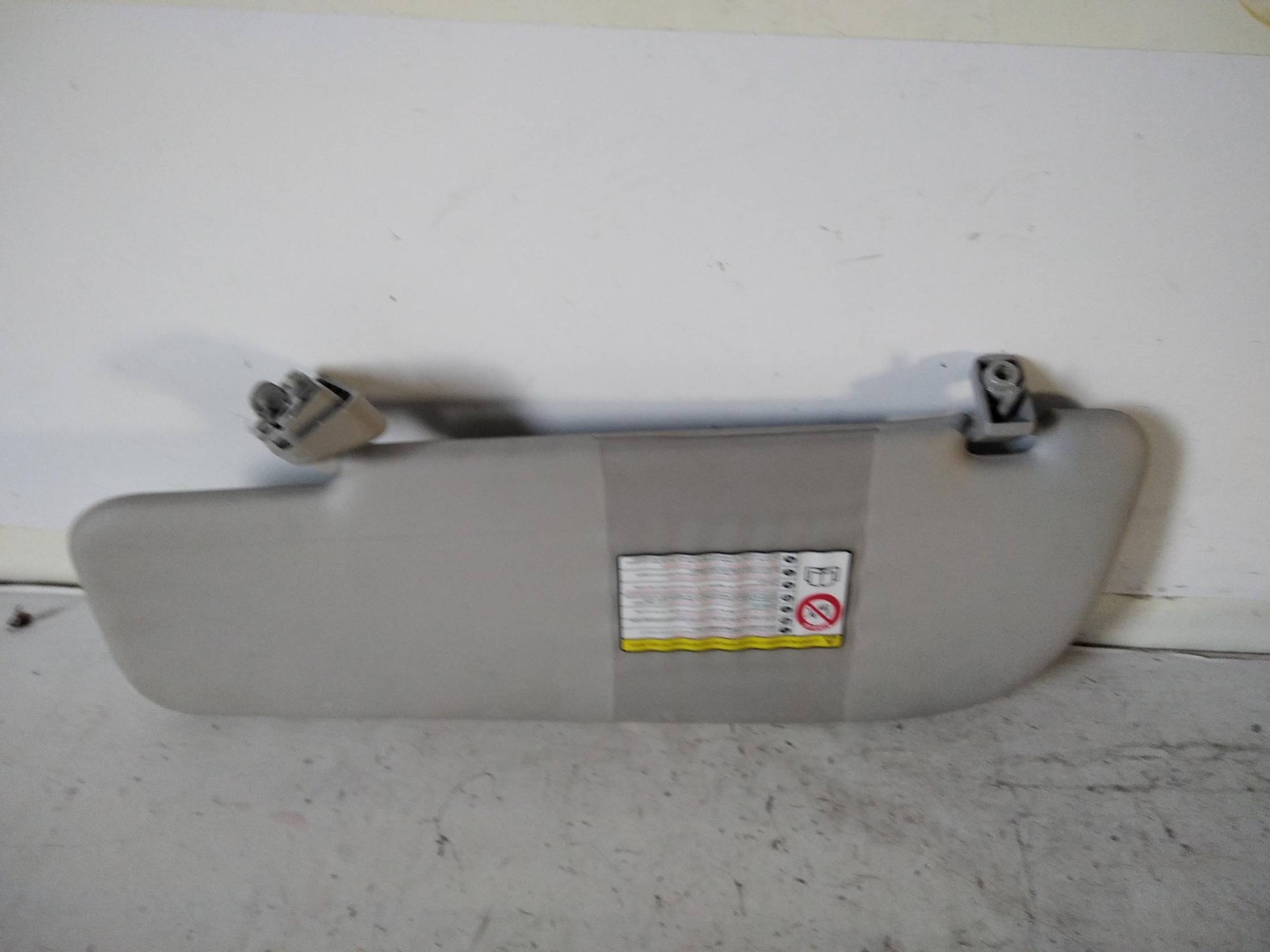 Aletta parasole parabrezza dx.